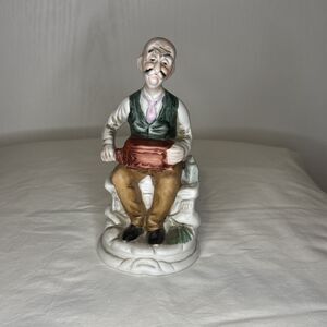 Vintage Collectible Porcelain Bald Old Man Seated with Music Box Hummel-like